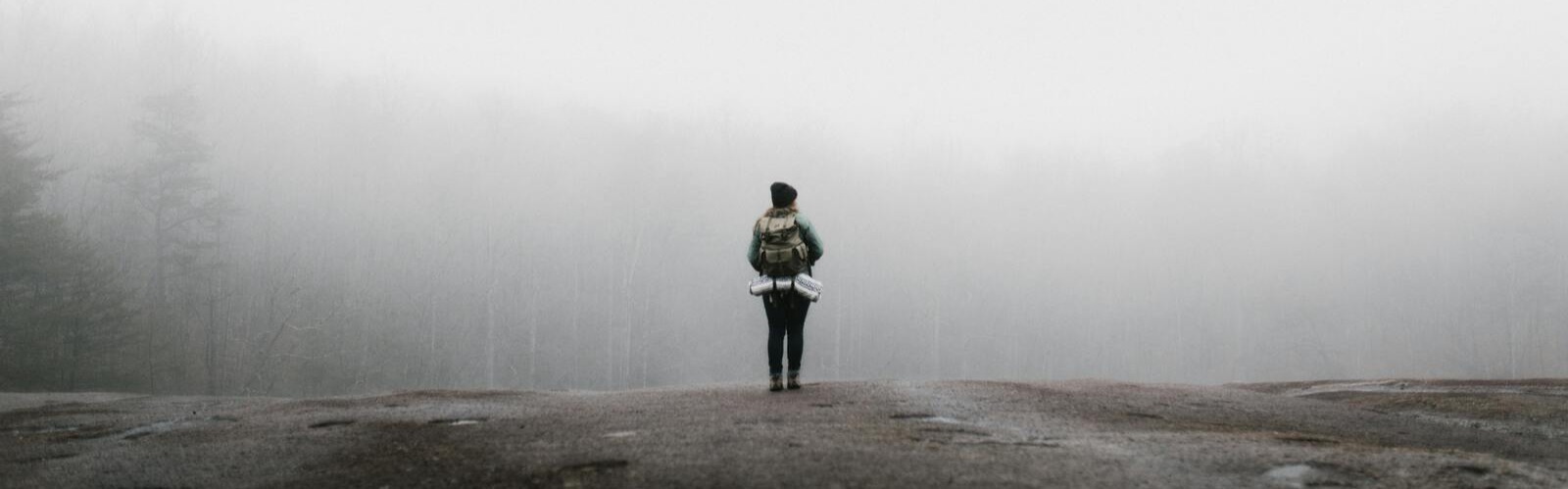 Woman on Foggy Path